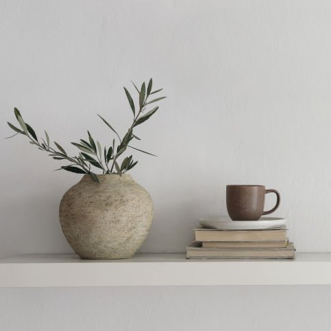 Cozy styled tray with candles and pumpkins