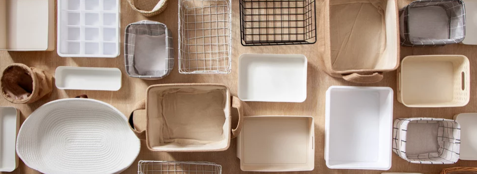 Neatly organized pantry with labeled bins and baskets